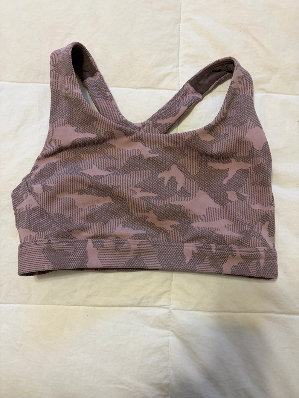 ATHLETA- size small Ultimate Textured Sports Bra in a pink camo colorway.